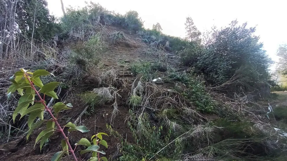 Cuáles son las tareas que debe realizar el propietario Huitan Co para contener el talud desmoronado